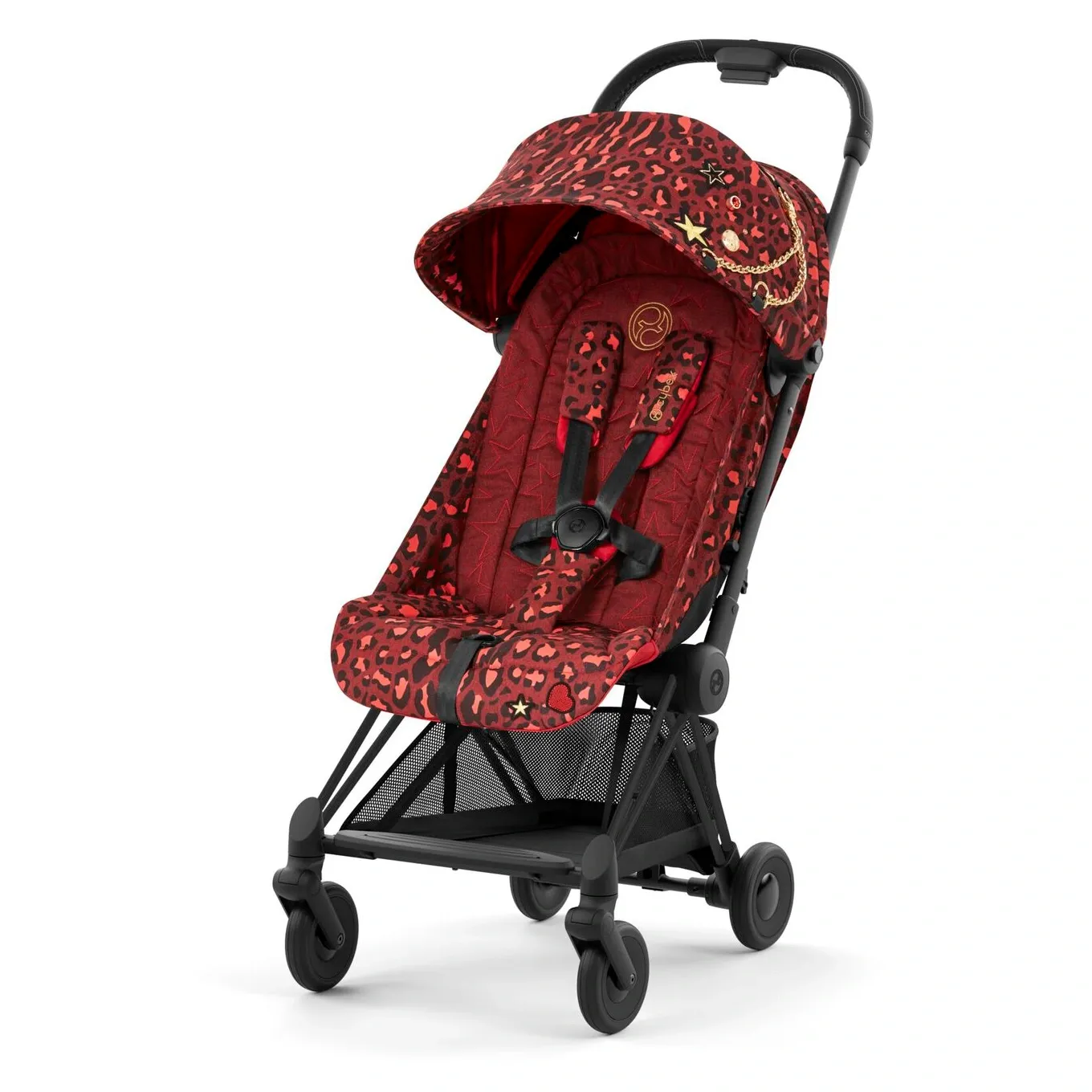 Cybex Coya в отделке Rockstar: красный леопард с золотой цепочкой, чёрное шасси